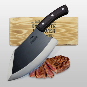 Butcher knife with a wooden cutting board and sliced steak on a light gray background