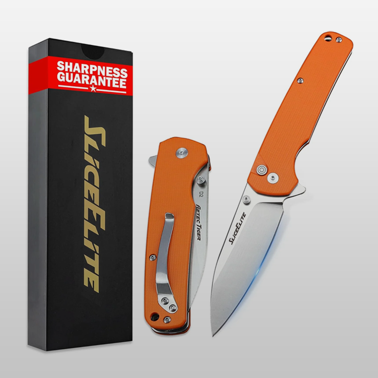 Orange folding knife with 'Slice Elite' branding and sharpness guarantee on packaging.