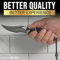 SliceEite Lotus Folding Knife holding in a hand, knife with 'Better Quality Better Experience' text on a tiled wall background