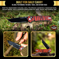 Folding knife with red and black zebra pattern handle, held in hand, on grass background