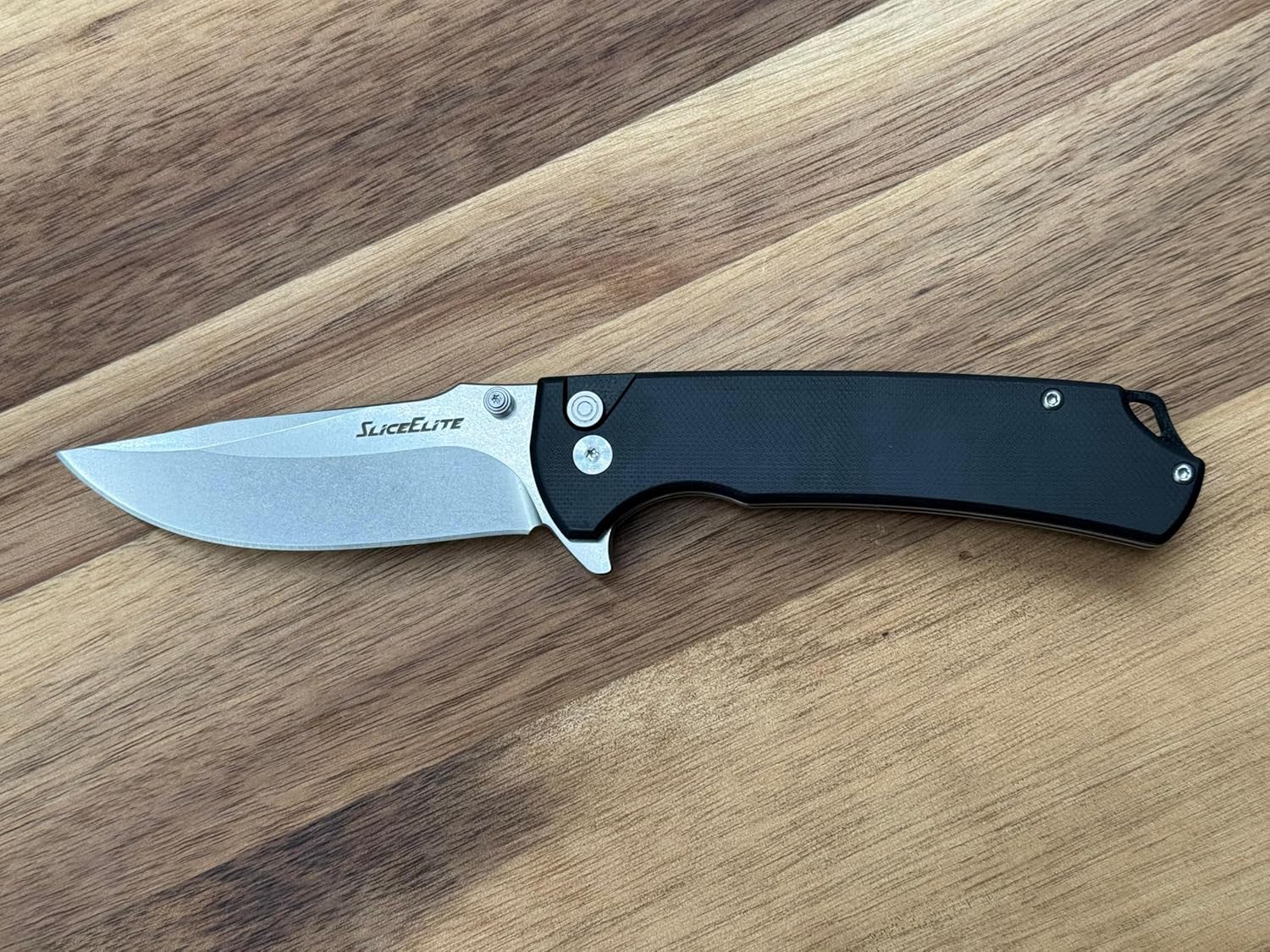 Stonewash D2 button lock folding knife