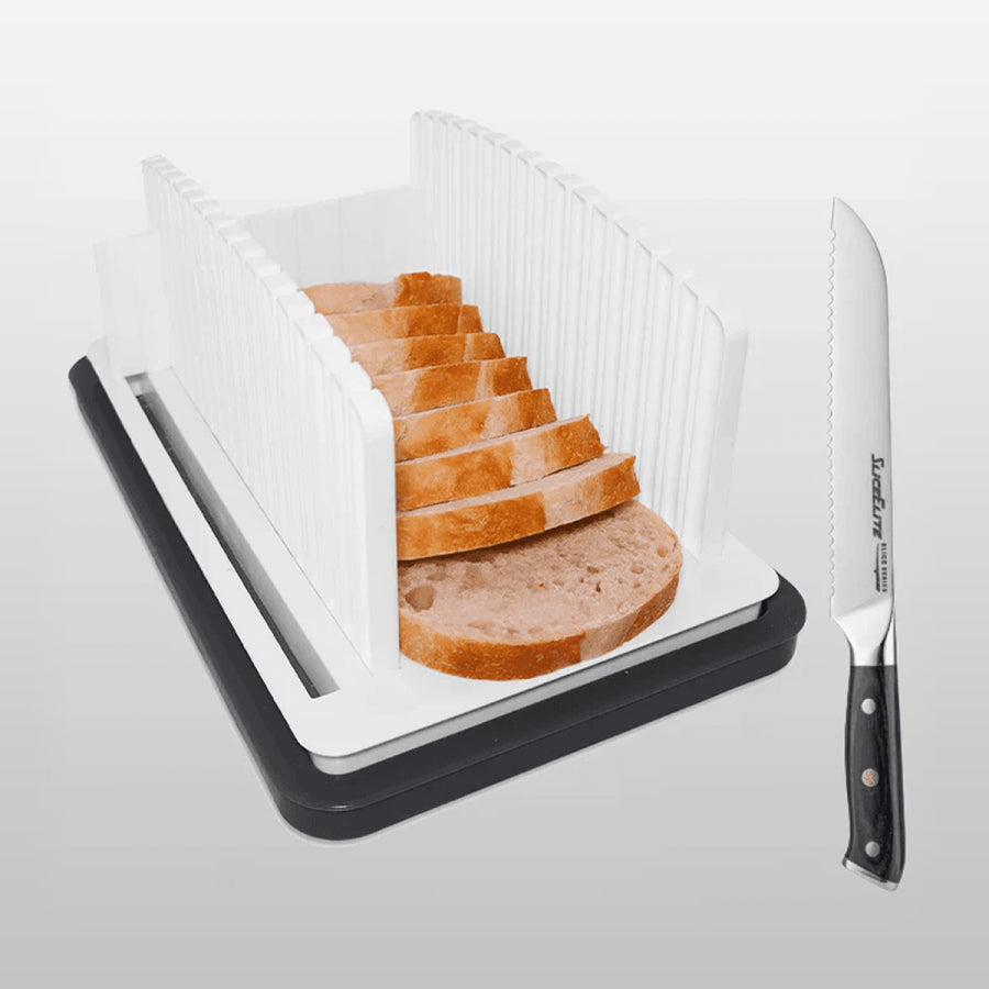 Bread slicer with sliced bread and a knife on a light gray background
