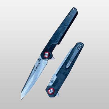 SliceElite carbon de noche Folding knife with a blue handle and silver blade on a light gray background