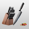 Set of knives with a wooden block and a single knife on a gray background with fruits and vegetables.
